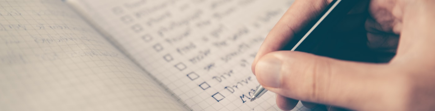 Planner and pen, suggesting new choices and habits