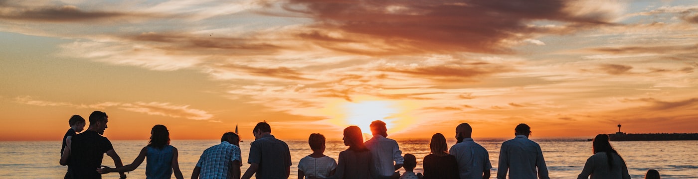 Family silhouette in evening light, suggesting family system roles