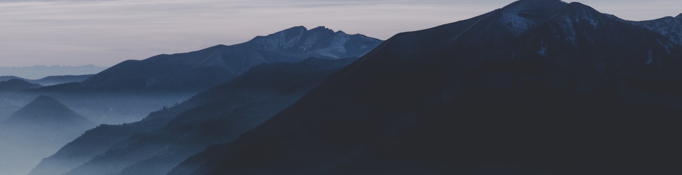 Misty mountain landscape, suggesting weight and depth of feeling